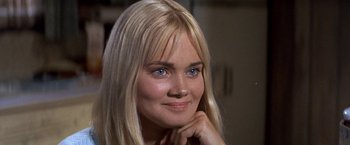 Movie still from “The Russians Are Coming the Russians Are Coming” (1966), directed by Norman Jewison – A person with blond hair and blue eyes; Close Up shot, Over the shoulder angle