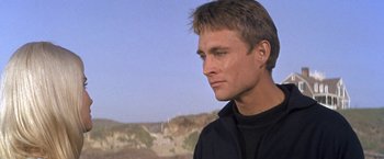 Movie still from “The Russians Are Coming the Russians Are Coming” (1966), directed by Norman Jewison – A person wearing a black shirt; Close Up shot, Low angle