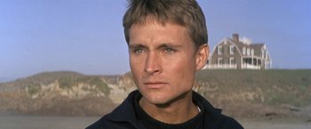 Movie still from “The Russians Are Coming the Russians Are Coming” (1966), directed by Norman Jewison – A person wearing a black shirt; Close Up shot, Low angle