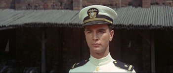 Movie still from “The Sand Pebbles” (1966), directed by Robert Wise – A person wearing a uniform; Close Up shot, Low angle