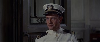 Movie still from “The Sand Pebbles” (1966), directed by Robert Wise – A person wearing a uniform; Close Up shot, High angle