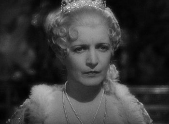 Movie still from “The Scarlet Empress” (1934), directed by Josef von Sternberg – An old photo of a woman wearing a tiara; Close Up shot, High angle