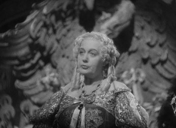 Movie still from “The Scarlet Empress” (1934), directed by Josef von Sternberg – An old black and white photo of a woman; Close Up shot, High angle