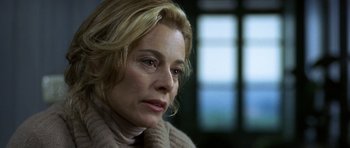 Movie still from “The Sea Inside” (2004), directed by Alejandro Amenábar – A person sitting in front of a window; Close Up shot, Over the shoulder angle