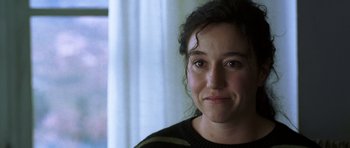 Movie still from “The Sea Inside” (2004), directed by Alejandro Amenábar – A woman's face in front of a window; Close Up shot, Over the shoulder angle