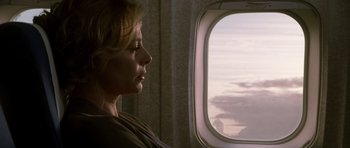 Movie still from “The Sea Inside” (2004), directed by Alejandro Amenábar – A woman looking out of an airplane window; Close Up shot, Low angle