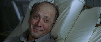 Movie still from “The Sea Inside” (2004), directed by Alejandro Amenábar – A person laying in a bed; Close Up shot, High angle