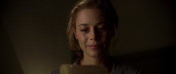 Movie still from “The Sea Inside” (2004), directed by Alejandro Amenábar – A person looking at a cell phone; Close Up shot, Low angle