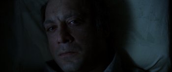 Movie still from “The Sea Inside” (2004), directed by Alejandro Amenábar – A person looking at the camera; Close Up shot, Overhead angle