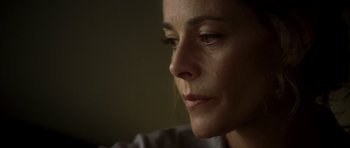 Movie still from “The Sea Inside” (2004), directed by Alejandro Amenábar – A person with a tear in her eye; Close Up shot, Low angle