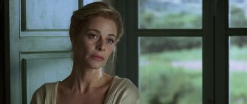 Movie still from “The Sea Inside” (2004), directed by Alejandro Amenábar – A beautiful woman sitting in front of a window; Close Up shot, Over the shoulder angle