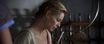Movie still from “The Sea Inside” (2004), directed by Alejandro Amenábar – A person wearing headphones; Close Up shot, Over the shoulder angle