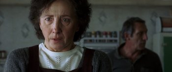 Movie still from “The Sea Inside” (2004), directed by Alejandro Amenábar – An older woman is looking at the camera; Close Up shot, Low angle