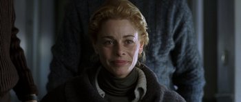 Movie still from “The Sea Inside” (2004), directed by Alejandro Amenábar – A person wearing a sweater; Close Up shot, Low angle