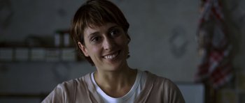 Movie still from “The Sea Inside” (2004), directed by Alejandro Amenábar – A person with short brown hair; Close Up shot, Over the shoulder angle
