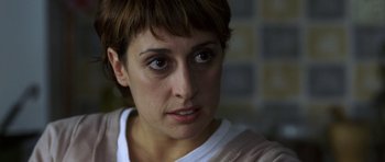 Movie still from “The Sea Inside” (2004), directed by Alejandro Amenábar – A person with short brown hair; Close Up shot, Over the shoulder angle