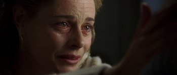 Movie still from “The Sea Inside” (2004), directed by Alejandro Amenábar – A person with her eyes wide open; Close Up shot, Over the shoulder angle