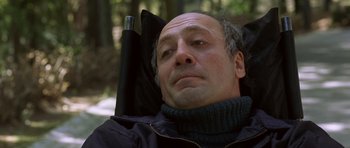 Movie still from “The Sea Inside” (2004), directed by Alejandro Amenábar – A person wearing a jacket; Close Up shot, High angle
