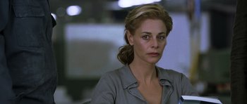 Movie still from “The Sea Inside” (2004), directed by Alejandro Amenábar – A person wearing a gray shirt; Close Up shot, Over the shoulder angle
