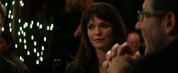 Movie still from “The Sea of Trees” (2015), directed by Gus Van Sant – A person sitting at a table; Close Up shot, Over the shoulder angle