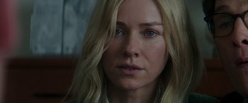 Movie still from “The Sea of Trees” (2015), directed by Gus Van Sant – A person with blonde hair; Close Up shot, Over the shoulder angle