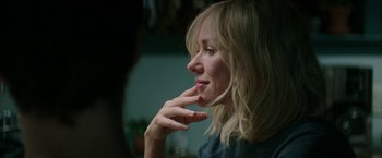 Movie still from “The Sea of Trees” (2015), directed by Gus Van Sant – A woman with blonde hair is looking to the side; Close Up shot, Over the shoulder angle