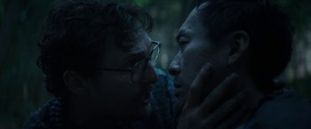 Movie still from “The Sea of Trees” (2015), directed by Gus Van Sant – Two men face each other in the dark; Close Up shot, Low angle