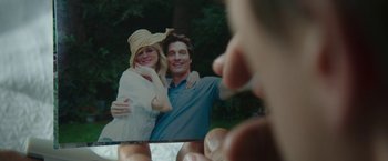 Movie still from “The Sea of Trees” (2015), directed by Gus Van Sant – A man taking a picture of a woman and a man; Close Up shot, Over the shoulder angle