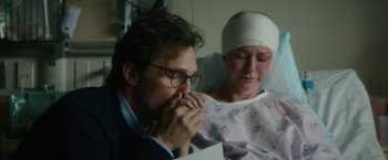 Movie still from “The Sea of Trees” (2015), directed by Gus Van Sant – A man and a woman sitting in a hospital bed; Close Up shot, Over the shoulder angle