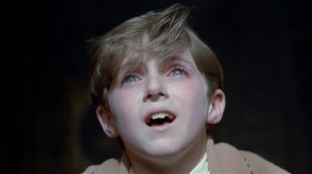Movie still from “The Secret Garden” (1993), directed by Agnieszka Holland – A young boy with blue eyes looking up at the sky; Close Up shot, Low angle