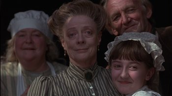 Movie still from “The Secret Garden” (1993), directed by Agnieszka Holland – A group of people standing next to each other; Close Up shot, Low angle