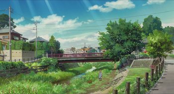 Movie still from “The Secret World of Arrietty” (2010), directed by Hiromasa Yonebayashi – A painting of a person standing on the side of a river; Extreme Wide shot, Low angle
