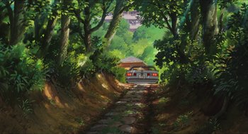 Movie still from “The Secret World of Arrietty” (2010), directed by Hiromasa Yonebayashi – A car driving down a dirt road through a forest; Extreme Wide shot, Low angle