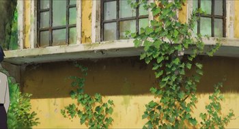 Movie still from “The Secret World of Arrietty” (2010), directed by Hiromasa Yonebayashi – A yellow building with ivy growing on it's side; Extreme Wide shot, Low angle
