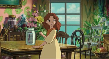 Movie still from “The Secret World of Arrietty” (2010), directed by Hiromasa Yonebayashi – A woman standing in front of a table with flowers on top of it; Medium shot, Over the shoulder angle