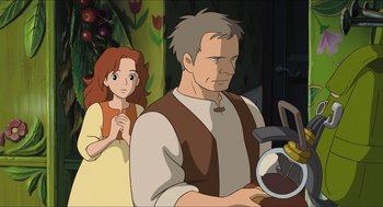 Movie still from “The Secret World of Arrietty” (2010), directed by Hiromasa Yonebayashi – A man and a woman are standing next to each other; Medium shot, Over the shoulder angle