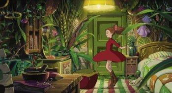 Movie still from “The Secret World of Arrietty” (2010), directed by Hiromasa Yonebayashi – A woman in a red dress is in a room with plants; Wide shot, High angle