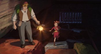 Movie still from “The Secret World of Arrietty” (2010), directed by Hiromasa Yonebayashi – A young girl is running through a cave while an older man watches; Wide shot, High angle