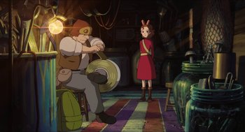 Movie still from “The Secret World of Arrietty” (2010), directed by Hiromasa Yonebayashi – An animated scene of a girl in a red dress; Wide shot, High angle