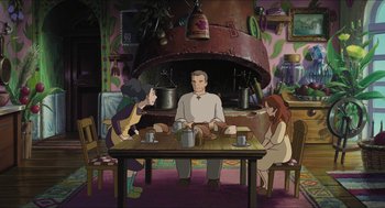 Movie still from “The Secret World of Arrietty” (2010), directed by Hiromasa Yonebayashi – A group of people sitting around a wooden table; Wide shot, High angle