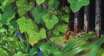 Movie still from “The Secret World of Arrietty” (2010), directed by Hiromasa Yonebayashi – A painting of a girl standing in front of a tree; Extreme Wide shot, High angle
