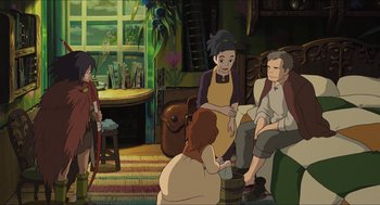 Movie still from “The Secret World of Arrietty” (2010), directed by Hiromasa Yonebayashi – A group of people sitting in a living room together; Wide shot, High angle