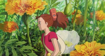 Movie still from “The Secret World of Arrietty” (2010), directed by Hiromasa Yonebayashi – A girl is walking through a field of flowers; Medium shot, High angle