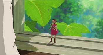Movie still from “The Secret World of Arrietty” (2010), directed by Hiromasa Yonebayashi – A girl in a red dress standing on some steps; Extreme Wide shot, High angle