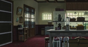 Movie still from “The Secret World of Arrietty” (2010), directed by Hiromasa Yonebayashi – An old fashioned kitchen with red carpeted floors; Extreme Wide shot, High angle
