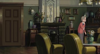 Movie still from “The Secret World of Arrietty” (2010), directed by Hiromasa Yonebayashi – A painting of a living room with a fire place; Extreme Wide shot, High angle