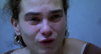 Movie still from “The Secret of the Grain” (2007), directed by Abdellatif Kechiche – A woman's eyes and mouth; Close Up shot, High angle