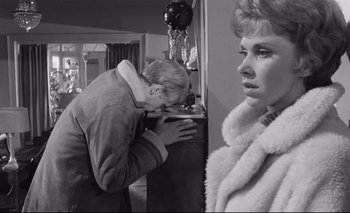Movie still from “The Servant” (1963), directed by Joseph Losey – An older man and a younger woman looking at each other; Medium shot, Over the shoulder angle