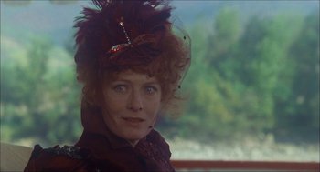 Movie still from “The Seven-Per-Cent Solution” (1976), directed by Herbert Ross – A person wearing a hat; Close Up shot, Over the shoulder angle