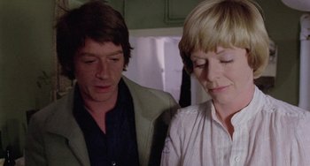 Movie still from “The Shout” (1978), directed by Jerzy Skolimowski – A man and a woman looking down at each other; Close Up shot, Over the shoulder angle